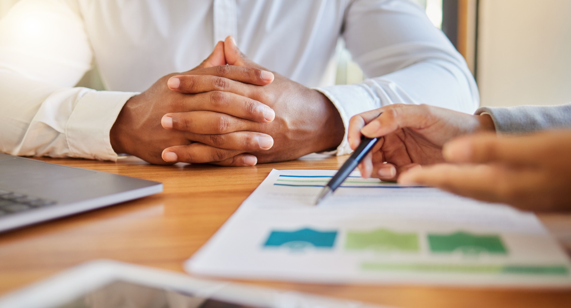 Business people planning with paper in meeting at work, team working on finance strategy with data and collaboration for marketing discussion in office. Hand of employee in conversation with document